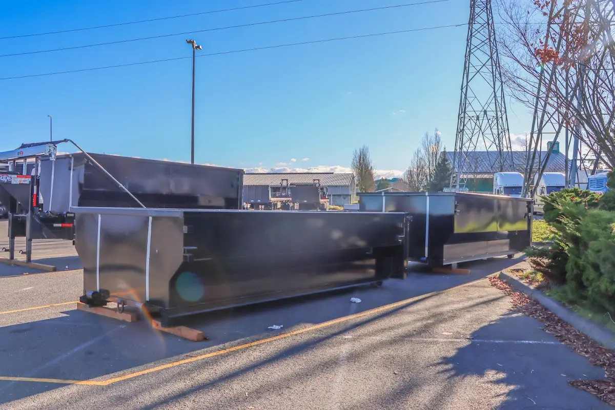 Roll-off dumpster ready for waste disposal at job site for 3 Yard Dumpster Rental in Helena